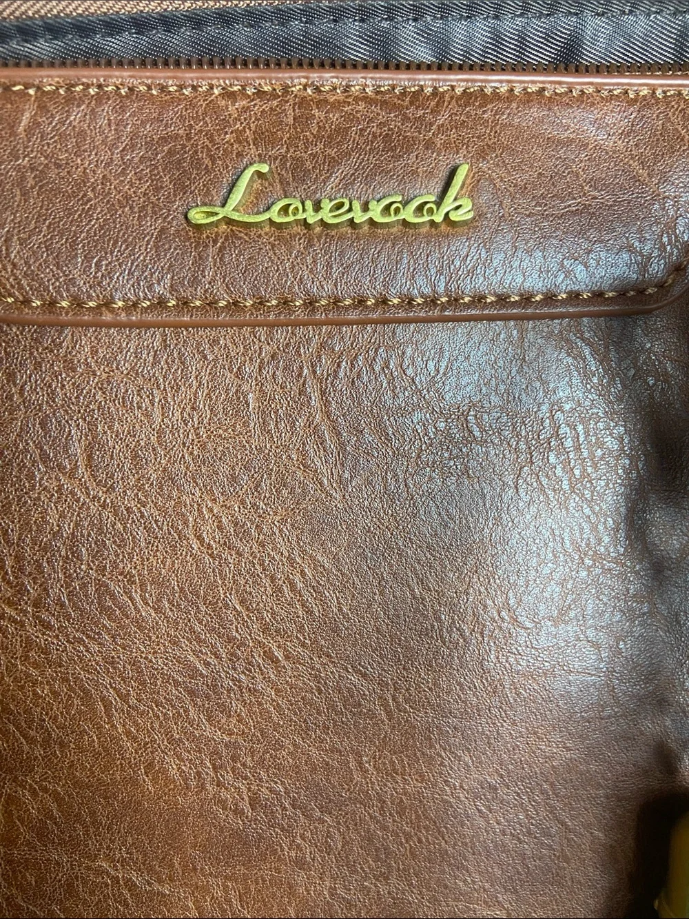 Leather-Textured Tan Tote with Tassel Accent for laptop work